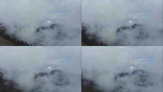 航拍云层中的山峰高清在线视频素材下载