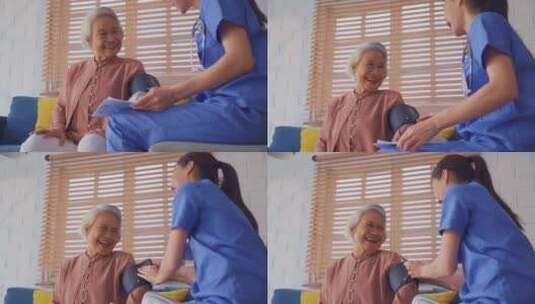 亚洲护理医生检查老年患者使用血压计。高清在线视频素材下载