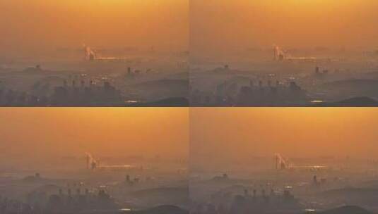 航拍徐州城市日出朝阳,平流雾工厂烟囱高清在线视频素材下载