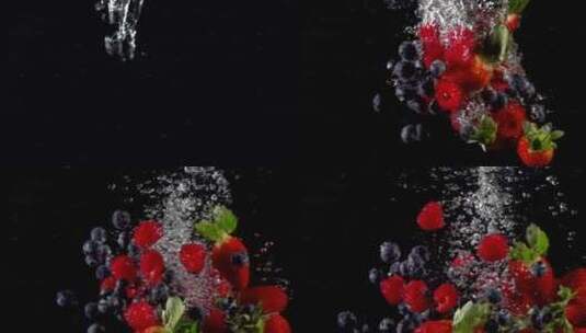 新鲜草莓落入水中溅起水泡泡高清在线视频素材下载