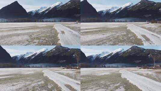 航拍冬季山脉道路冰雪风景高清在线视频素材下载