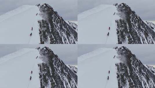 航拍攀登四川岷山山脉雪宝顶雪山的登山队高清在线视频素材下载