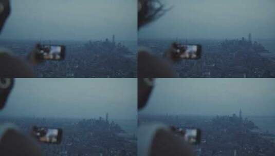 女人站在高处用手机拍摄城市景观高清在线视频素材下载