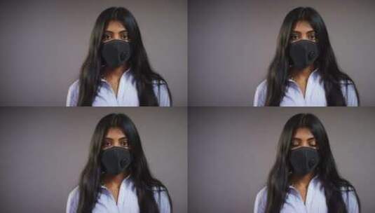 戴口罩的年轻女子高清在线视频素材下载