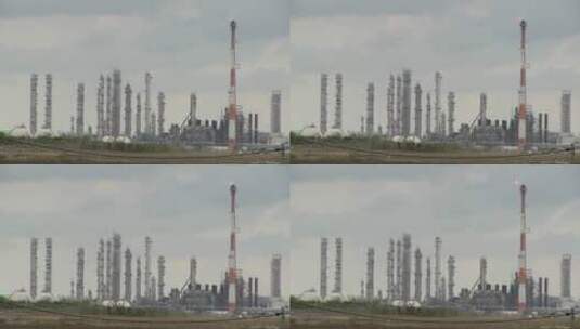 炼油厂的烟囱里冒出火花高清在线视频素材下载