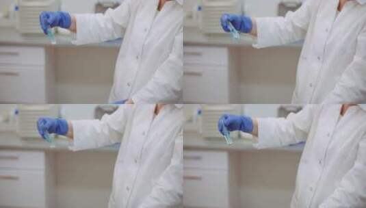 科学家用移液管分析液体高清在线视频素材下载
