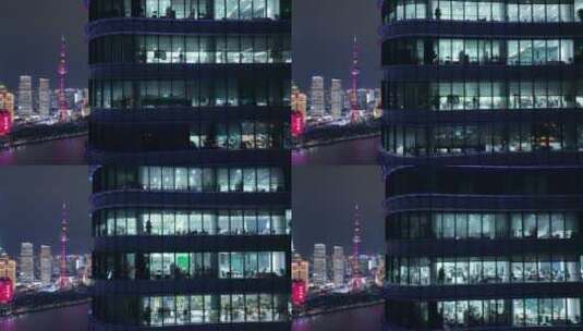 航拍上海商务楼白领加班忙碌夜景高清在线视频素材下载