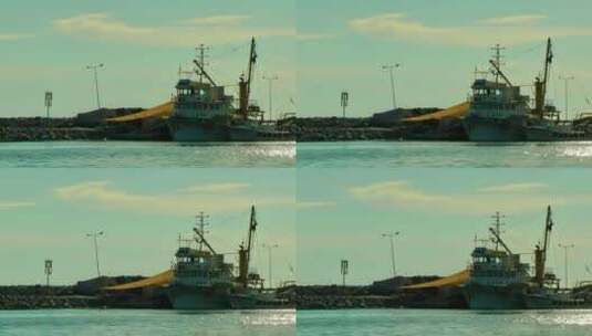 停泊在海岸上的一艘渔船高清在线视频素材下载