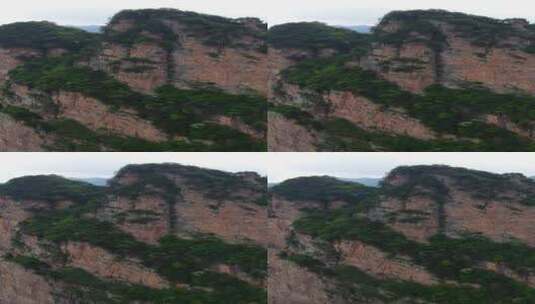 航拍陡峭悬崖高山峡谷风光高清在线视频素材下载