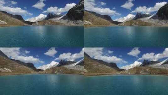亚丁 雪山顶湖面航拍高清在线视频素材下载