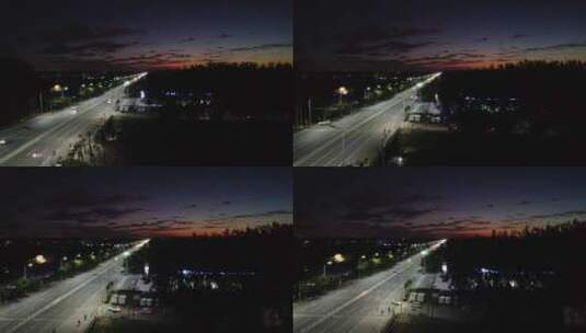 航拍夜景城市街道车流晚霞道路公路路灯高清在线视频素材下载