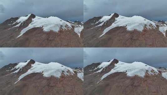 航拍四川甘孜沙鲁里山脉尼登贡嘎雪山高清在线视频素材下载