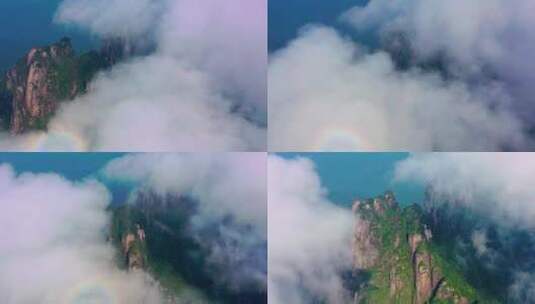 航拍云雾缭绕的山峰高清在线视频素材下载