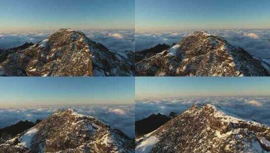 无人机拍摄了人们站在一起观看山顶美景的镜头高清在线视频素材下载