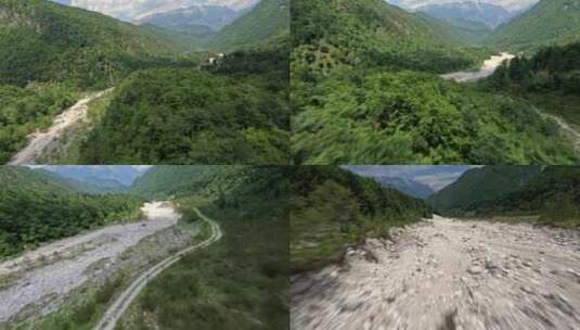 FPV穿越机无人机航拍森林山脉山谷绿树林高清在线视频素材下载