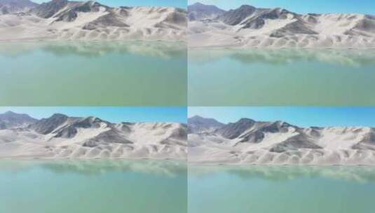 新疆青色湖岸边小山丘航拍高清在线视频素材下载