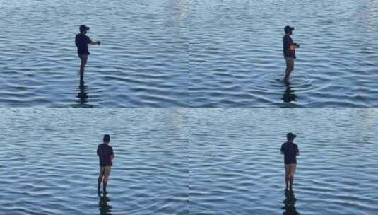 河流波光粼粼暖阳光影钓鱼的人高清在线视频素材下载