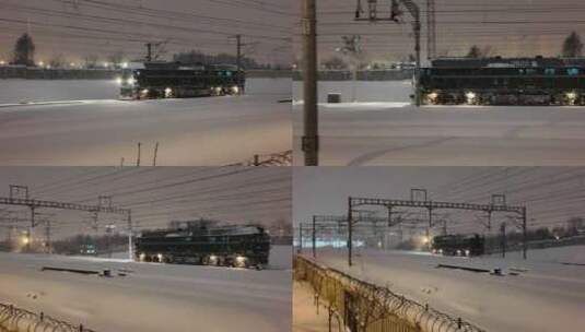 夜晚暴雪中行驶的火车头高清在线视频素材下载