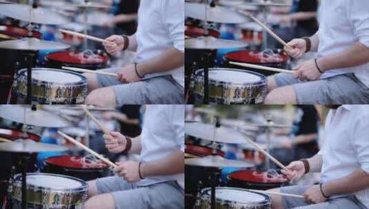 男人在外面打红鼓的特写镜头高清在线视频素材下载