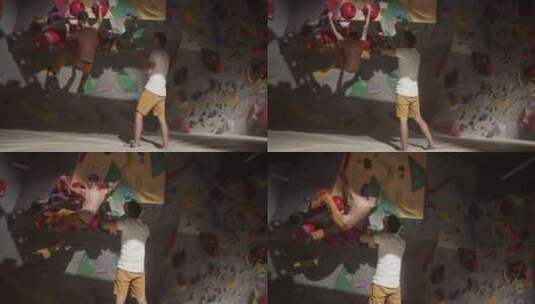匿名男子在健身房练习攀岩高清在线视频素材下载