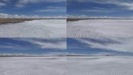 西藏旅行纳木措春季冬季冰面自然风光航拍高清在线视频素材下载