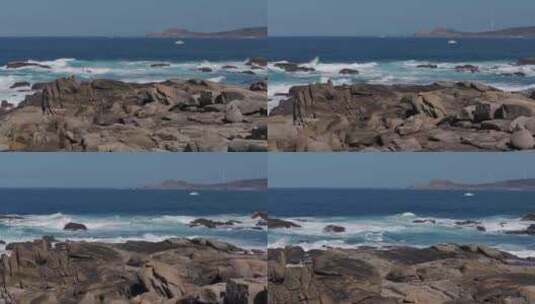 西班牙穆西亚海滩岩石海岸的海浪撞击。慢动高清在线视频素材下载