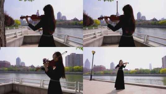 小提琴家天津海河边拉小提琴7高清在线视频素材下载