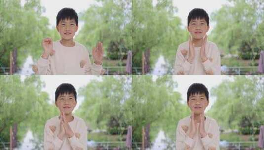 可爱的中国小男孩做手势鼓掌唯美慢镜高清在线视频素材下载