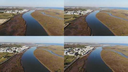 无人机航拍河口附近的社区高清在线视频素材下载