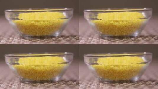 玻璃碗浸泡小米棒茬粗粮高清在线视频素材下载