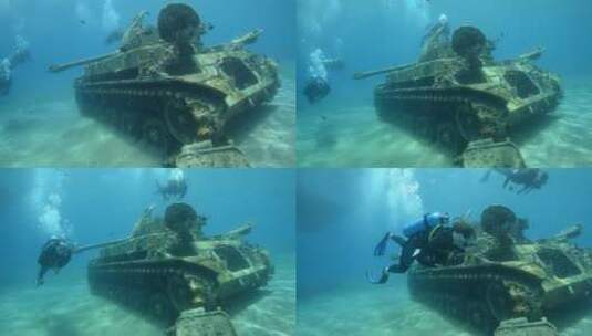 潜水者在海底探索沉没的坦克高清在线视频素材下载