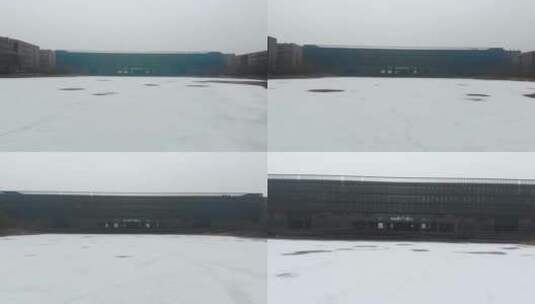 航拍雾霾大雪过后的大学校园高清在线视频素材下载