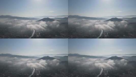航拍清晨山间云雾缭绕云层之上高清在线视频素材下载