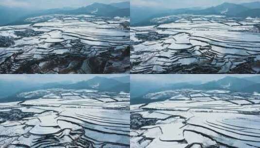 冬季白雪覆盖山川线条明显田野远处连绵雪山高清在线视频素材下载