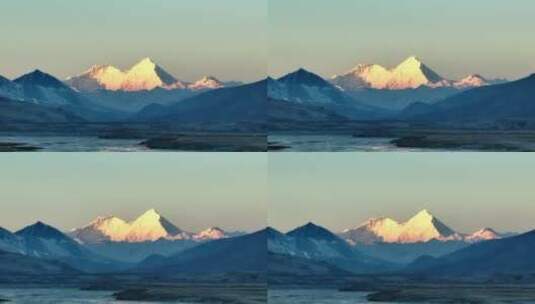西藏珠穆朗玛峰日照金山长焦航拍高清在线视频素材下载