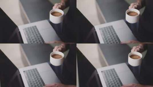 用笔记本电脑喝咖啡的人高清在线视频素材下载