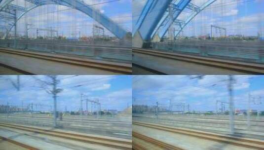 广州高铁动车窗外城市建筑与桥梁景观高清在线视频素材下载