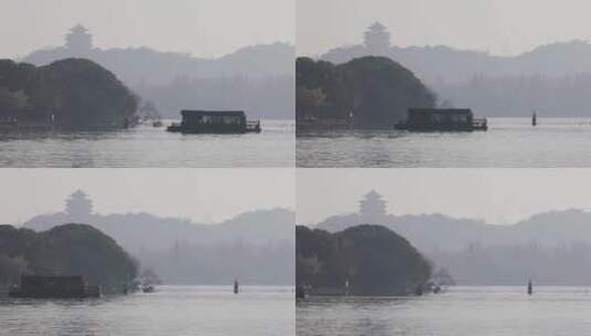 杭州西湖湖面游船手划船晨曦空镜高清在线视频素材下载
