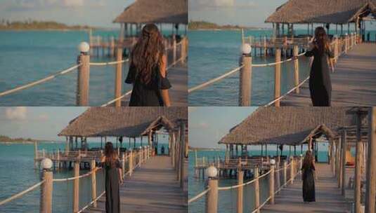 黑色长裙气质美女自由自在在海边度假高清在线视频素材下载