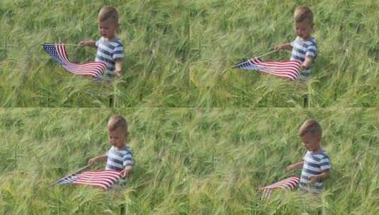 晴天独立日，男婴在麦田挥舞美国国旗高清在线视频素材下载