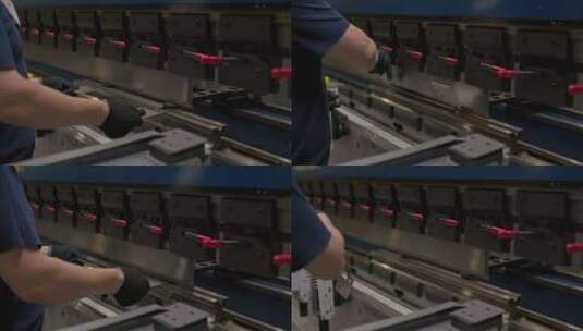 工厂工人用机器弯曲金属零件高清在线视频素材下载