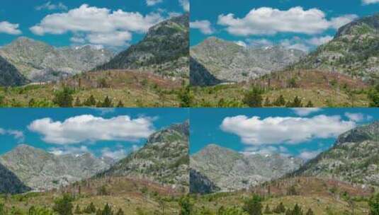 格里巴杰黑山山谷中带有云的精确山脉的延时视图高清在线视频素材下载