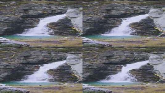 山川岩石里的瀑布高清在线视频素材下载