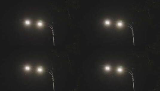 雨夜的城市、路面和路灯4k高清在线视频素材下载