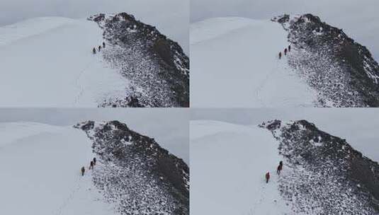 航拍攀登四川岷山山脉雪宝顶雪山的登山队高清在线视频素材下载