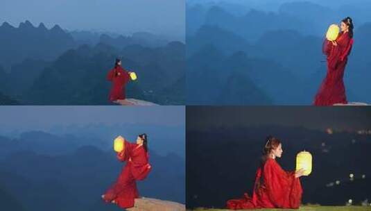红衣古装女子持灯于山间起舞mv高清在线视频素材下载
