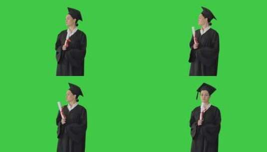 女学生在绿幕下挥舞着毕业证书高清在线视频素材下载