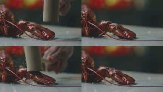 厨师打碎龙虾爪子的特写高清在线视频素材下载