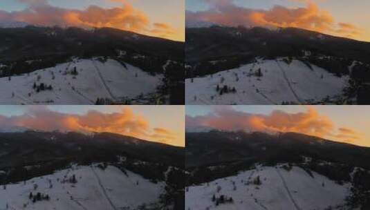 无人机航拍冬季日落山脉高清在线视频素材下载