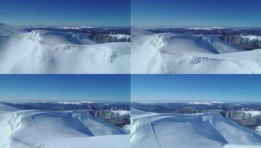 在晴朗的天空中看到的雪山山脉高清在线视频素材下载